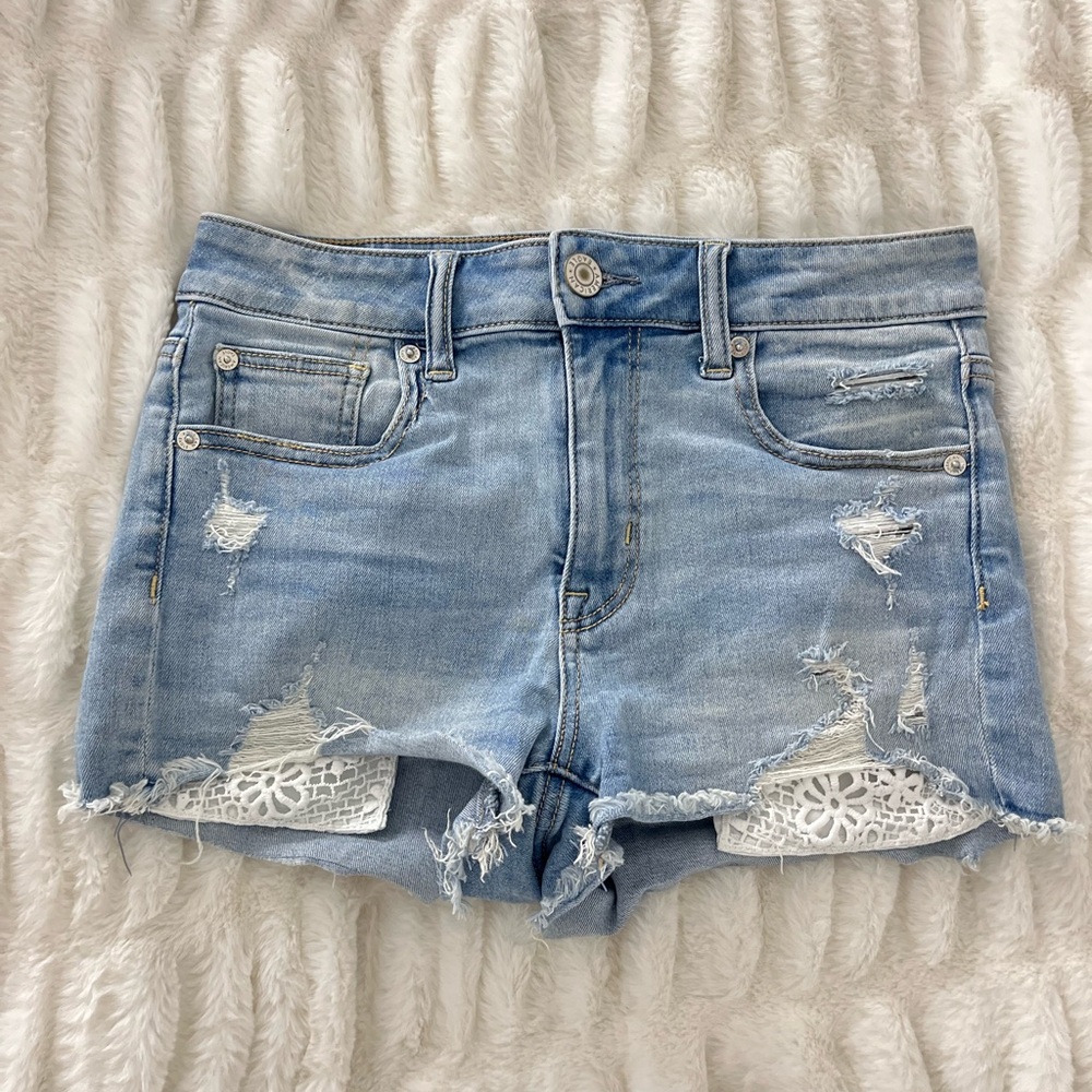 American Eagle Light Wash Denim Shorts with Lacy Pocket Design